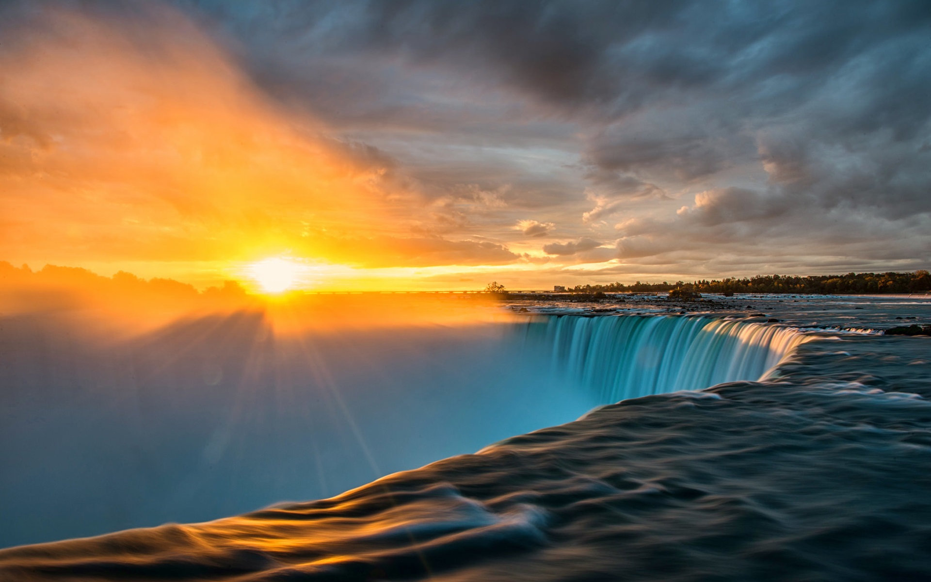 Niagara-Falls-sun-rays-sunrise-clouds_1920x1200.jpg
